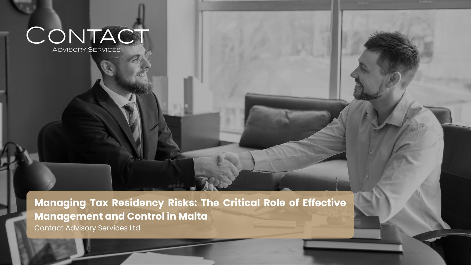 Two men in an office shake hands across a desk, with the 'Contact Advisory Services' logo visible in the upper left.